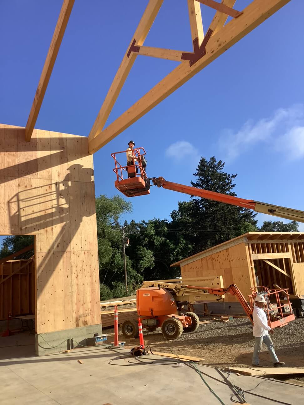 crew on boom, trusses, working